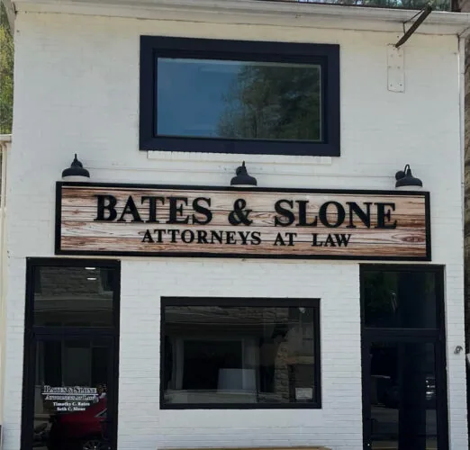 Exterior view of our office and Bates & Sloan Attorneys at Law sign